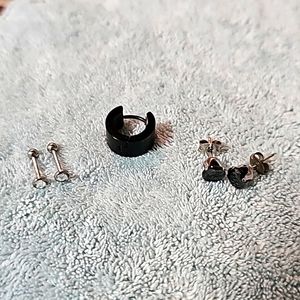 Bundled earrings and black ear cuff